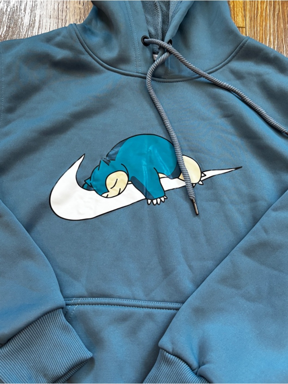 Teal Pullover Hoodie with White Swoosh and Sleeping Creature - Picture 4 of 9